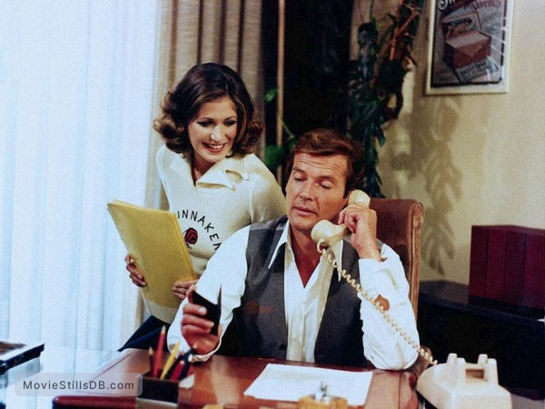 Gli Esecutori Publicity Still Of Roger Moore Loretta Persichetti