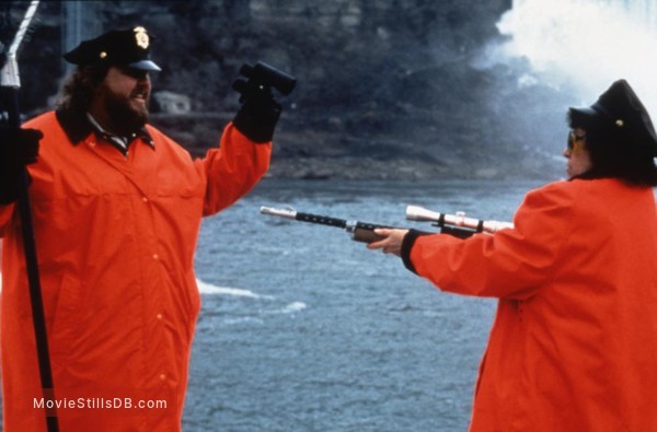 Canadian Bacon - Publicity still of Rhea Perlman & John Candy