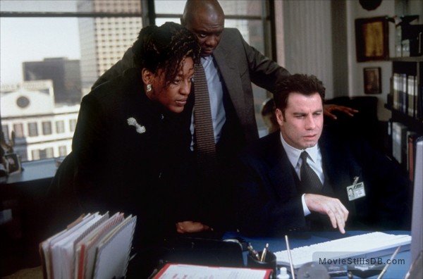 Face/Off - Publicity still of John Travolta, CCH Pounder & Robert Wisdom Face/Off - Publicity still of John Travolta, CCH Pounder & Robert Wisdom