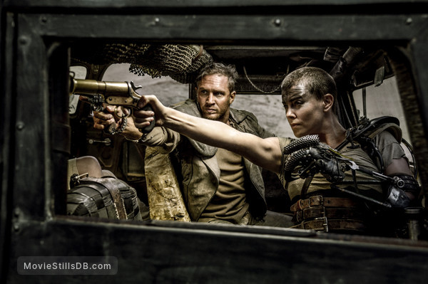 Mad Max: Fury Road - Publicity still of Charlize Theron & Tom Hardy Mad Max: Fury Road - Publicity still of Charlize Theron & Tom Hardy