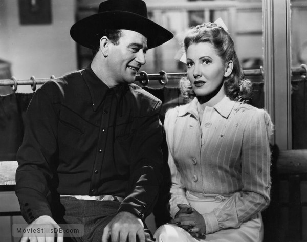 A Lady Takes a Chance - Publicity still of John Wayne & Jean Arthur