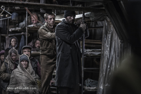 Snowpiercer - Publicity still of Chris Evans & Jamie Bell