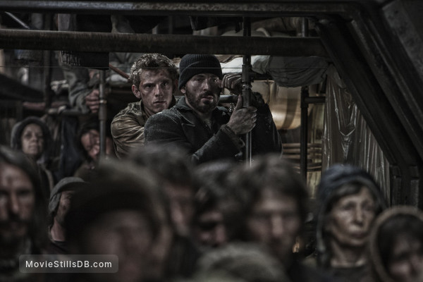 Snowpiercer - Publicity still of Chris Evans & Jamie Bell